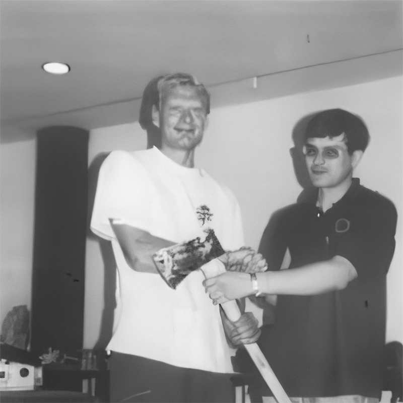 1995: Peter Holloway presenting the A&F Warehouse Golden Axe to top British climber Jan Grzeda