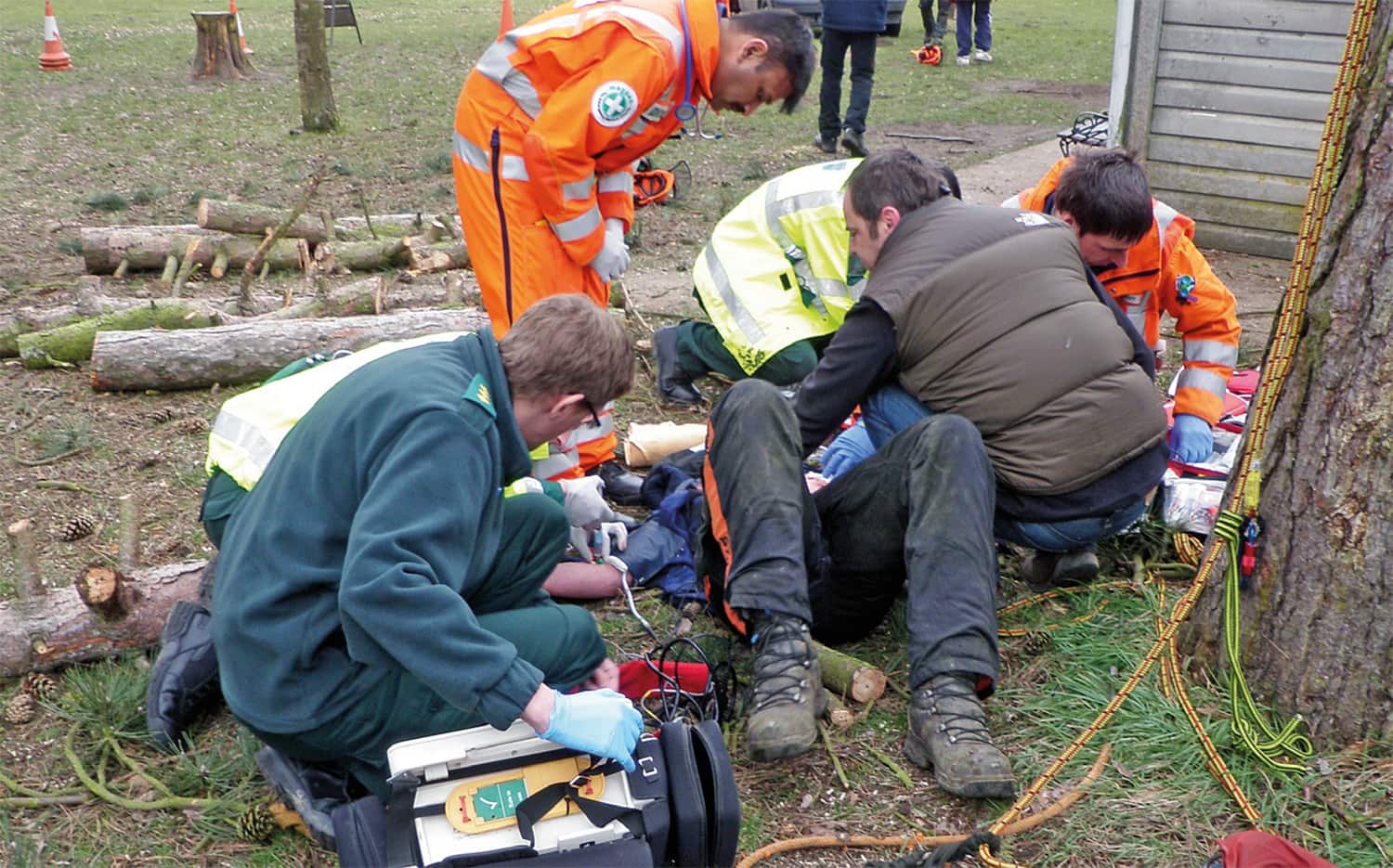 First Aid being administered to an injured arborist