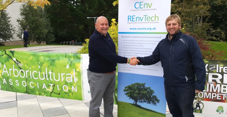 AA CEO Stewart Wardrop congratulates Simon Cox on gaining his CEnv status